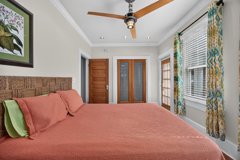 Bedroom view toward the hallway with wood doors at 1555 Belmonte Ave, Jacksonville, FL 32207