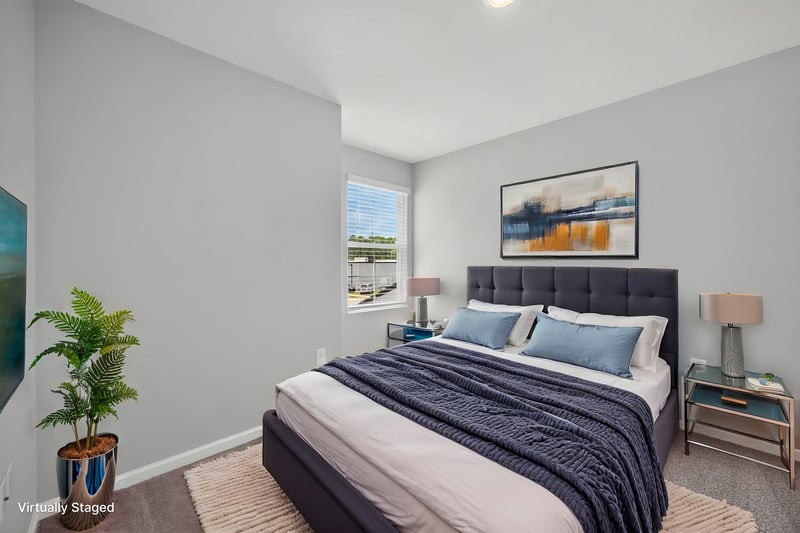 Bedroom virtually staged with dark headboard at 2837 Black Buck Cir, Jacksonville, FL 32225