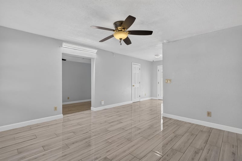 Living room with wood-look flooring and window at 442 Ameca Ave, Orange Park, FL 32073