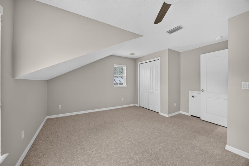 Empty hallway with doorways at 117 Island Cottage Way, St. Augustine, FL 32080