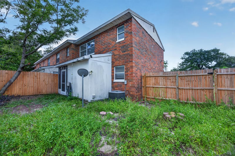 Backyard with brick exterior and storage shed at 2658 Trollie Ln apt 1, Jacksonville, FL 32211