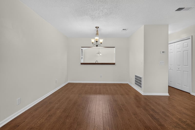 Dining area with wood floors at 4427 Millstone Ct, Jacksonville, FL