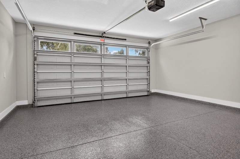 Garage interior with finished floor at 175 Alava Ct