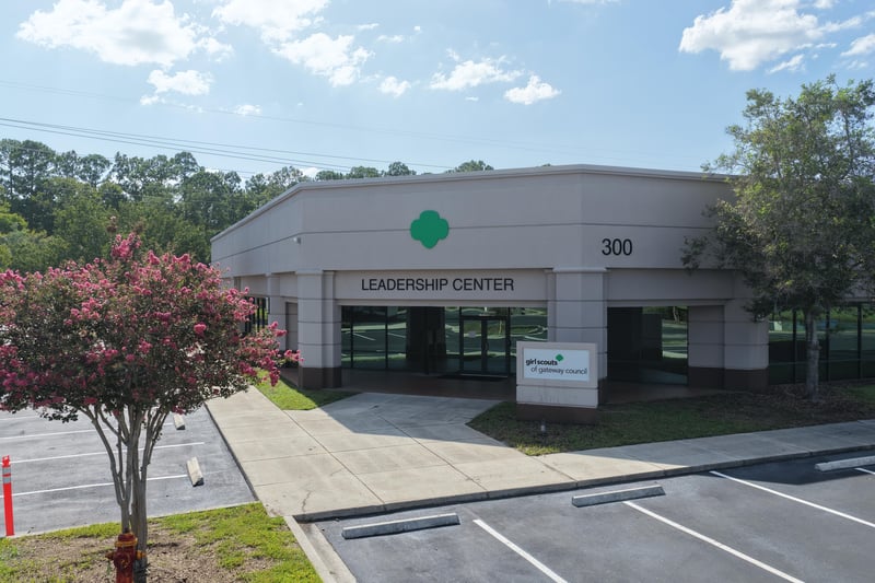 Building front with Leadership Center signage and crape myrtle at 10550 Deerwood Park Blvd, Jacksonville, FL 32256