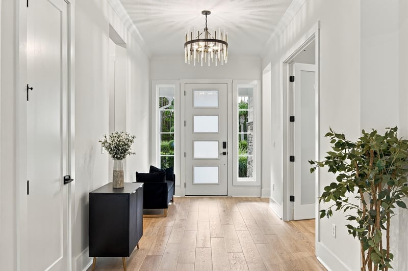Foyer with front door and chandelier at 907 Seagrove Dr, Ponte Vedra Beach, FL 32081