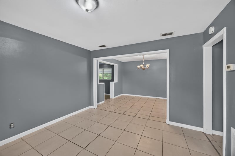 Open hallway leading to dining area at 6745 Jack Horner Ln, Jacksonville, FL 32210