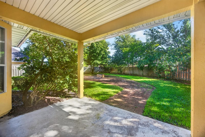 Covered patio with backyard view at 470 Sparrow Branch Cir, Jacksonville, FL 32259