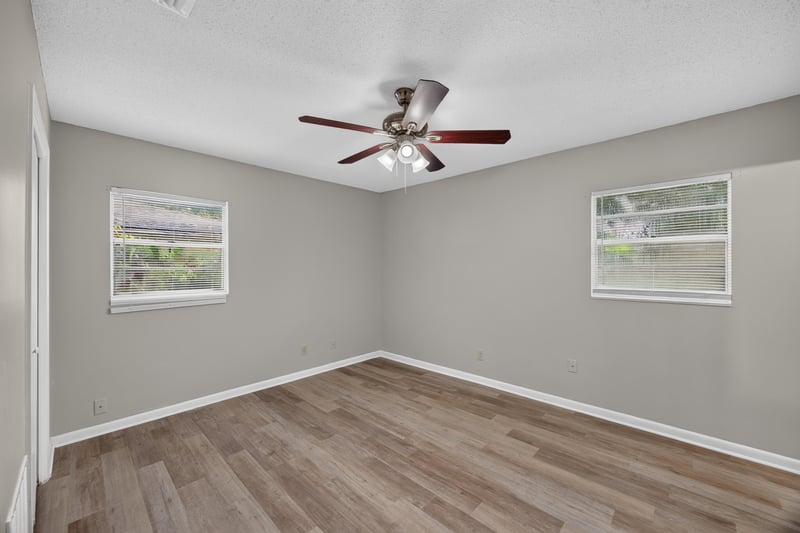 Kitchen with white range and vent hood at 12351 Condor Dr