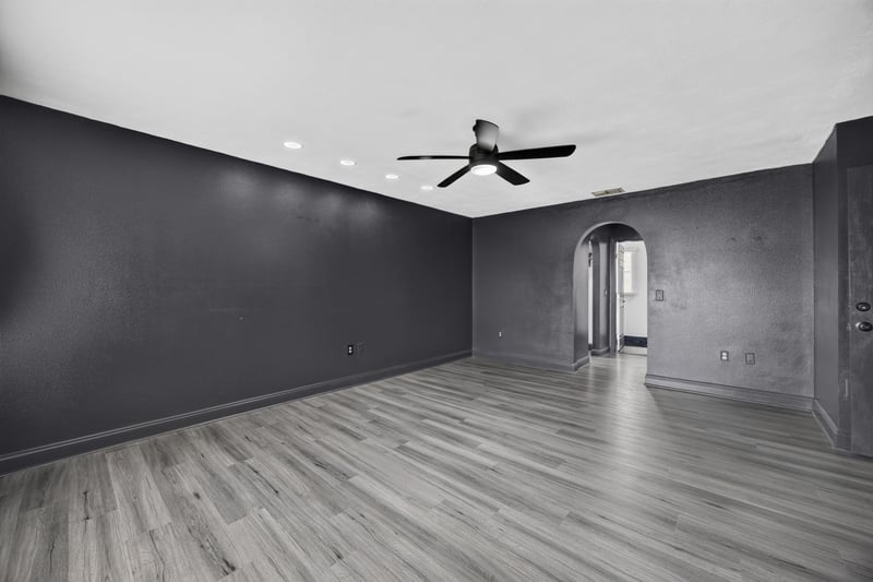 Bedroom with gray walls and arched doorway at 3428 Glenn Hollow Ct, Jacksonville, FL 32226