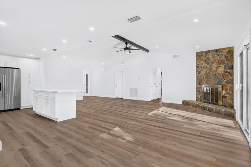 Kitchen island with view toward living room at 8453 Boysenberry Ln W, Jacksonville, FL