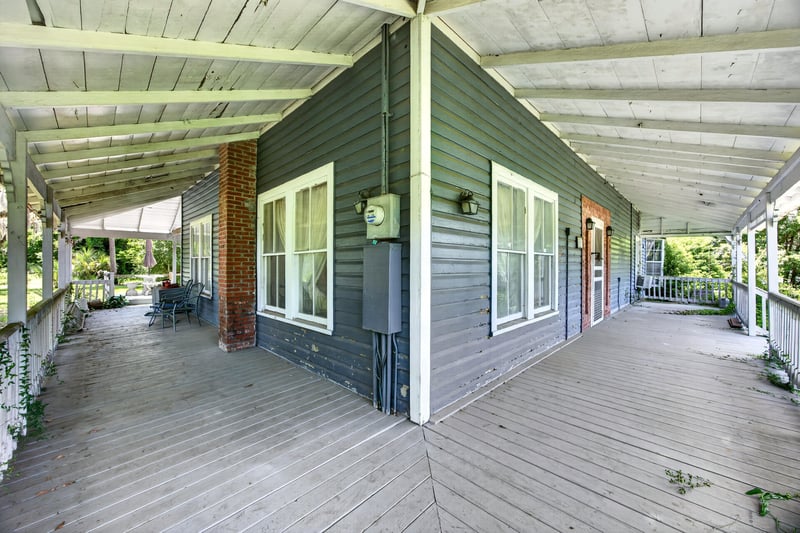 Covered porch along the side of the house at 1173 US-17, Satsuma, FL 32189