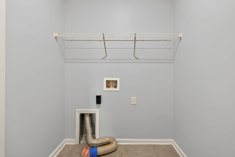 Laundry room with wire shelving and hookups at 2378 Caney Oaks Dr, Jacksonville, FL