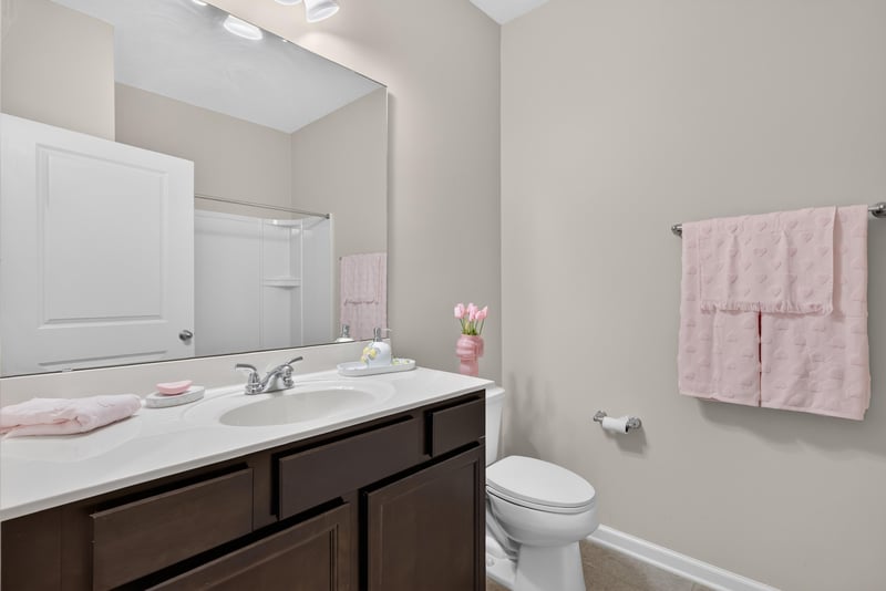 Bathroom vanity with mirror at 2378 Caney Oaks Dr, Jacksonville, FL