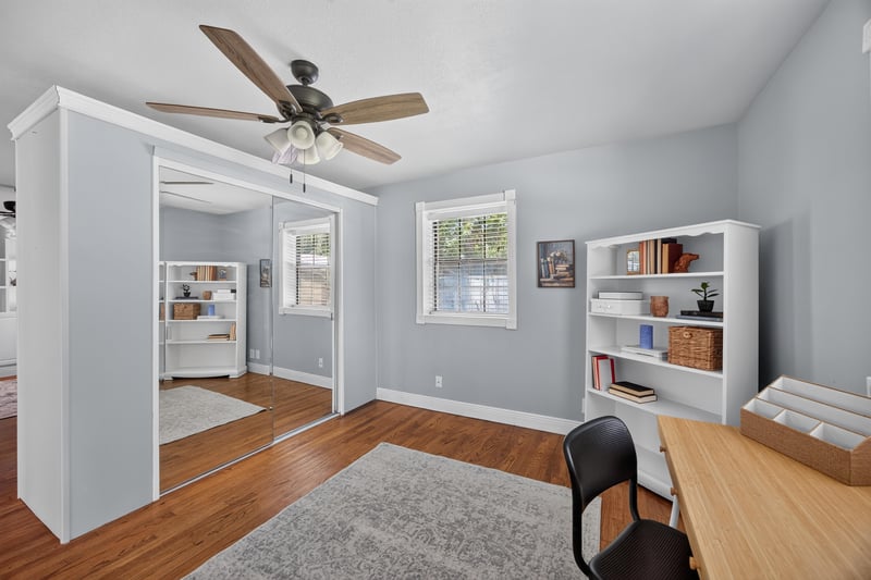Bedroom with built-in shelving and closet at 5843 Ovella Rd, Jacksonville, FL 32244