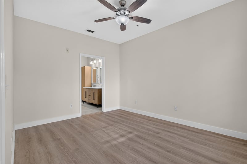 Hallway with ceiling fan and closet door at 11251 Campfield Dr unit 1202, Jacksonville, FL 32256