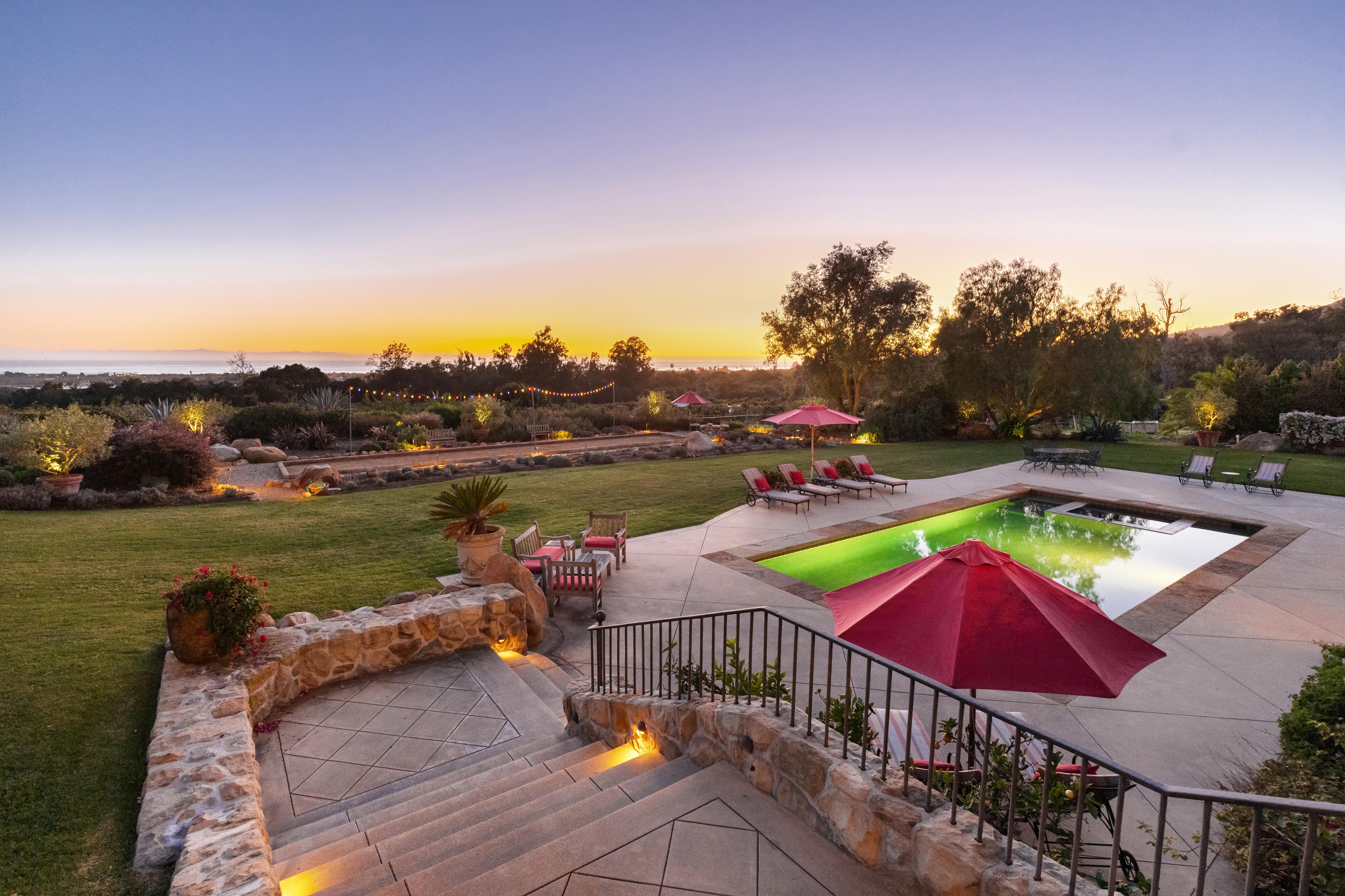 Professional real estate photography of grand interior living spaces at 1915 Monte Alegre Dr, Carpinteria — warm natural light and architectural scale define this exceptional Carpinteria bluffs residence. Our team captured editorial photography, aerial drone photography via Inspire 3 Cinema Drone, a cinematic property video, a true vertical social media reel, and twilight photography from midday through twilight.