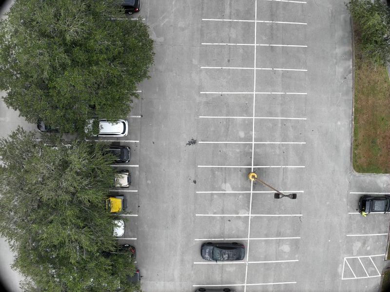 Aerial view of parking lot with tree island at 9406 Atlantic Blvd, Jacksonville, FL 32225
