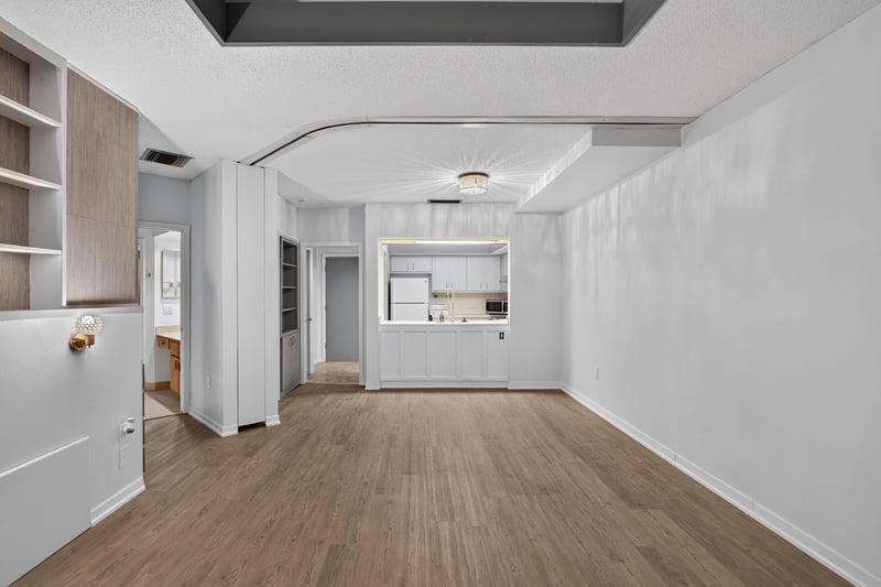 Hallway view toward the kitchen pass-through at 2910 Ravines Rd, Middleburg, FL 32068