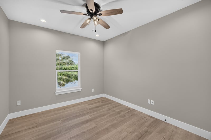 Bedroom with window and ceiling fan at 175 Alava Ct
