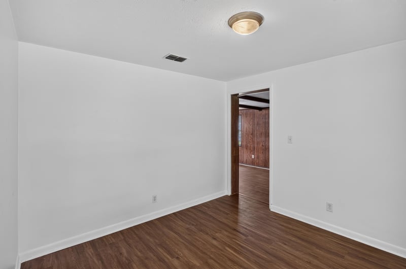 Empty room with doorway to hall at 5812 Tampico Rd, Jacksonville, FL 32244