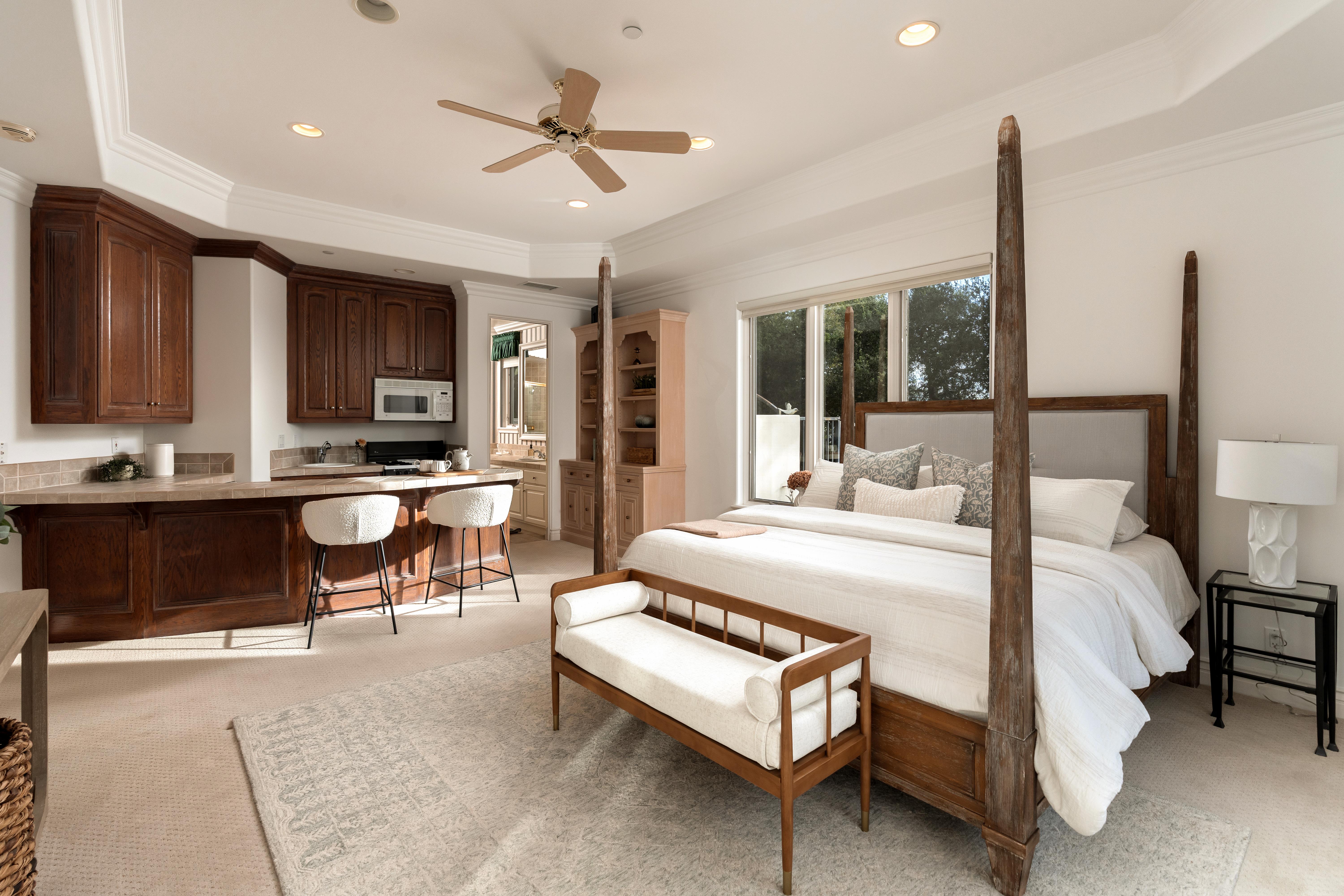 Professional real estate photography of primary suite and ocean-view terrace at 450 El Cielito Rd, Santa Barbara — Matterport virtual tour and still photography package for a distinguished Santa Barbara Riviera estate above Hope Ranch. Our team captured still photography, aerial drone photography, twilight photography, a Matterport virtual tour, a 2D floor plan, and a custom property website from afternoon through twilight.