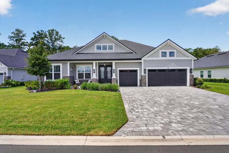 Front exterior in daylight with manicured lawn at 785 Back Creek Dr, St. Augustine, FL 32092