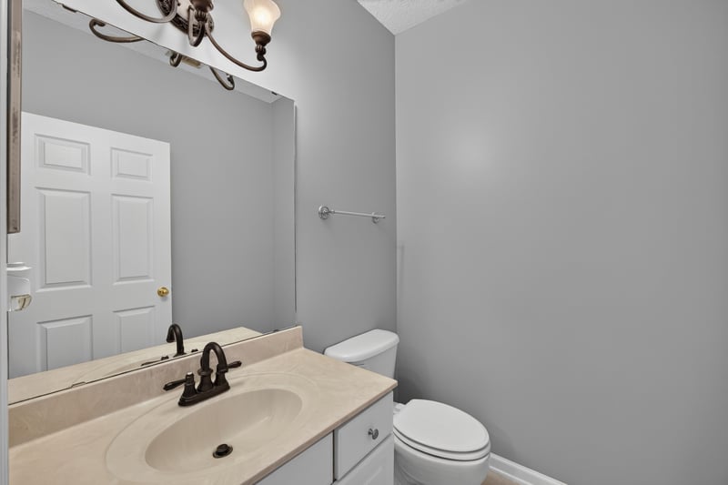 Bathroom vanity and toilet at 470 Sparrow Branch Cir, Jacksonville, FL 32259