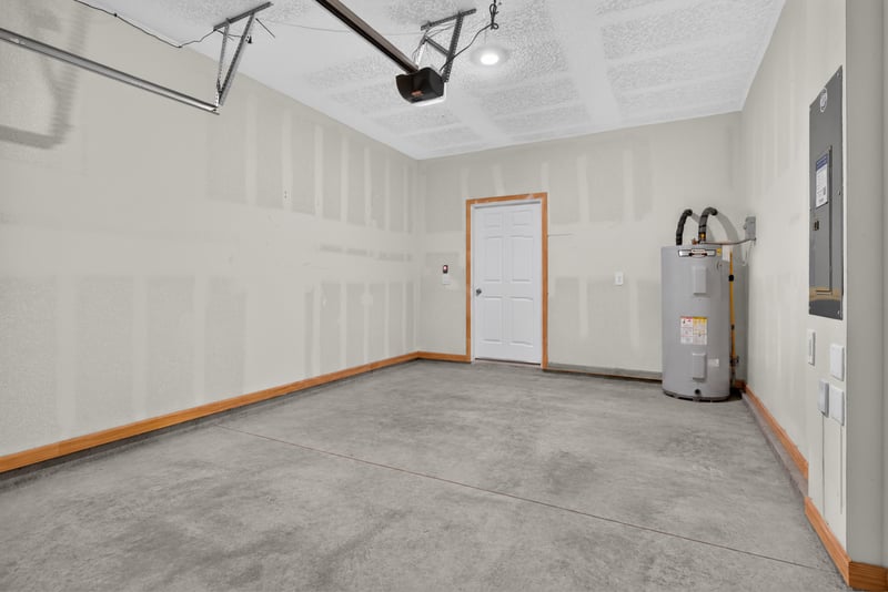 Garage interior with water heater at 4024 Bay Hawk Ct, Jacksonville, FL