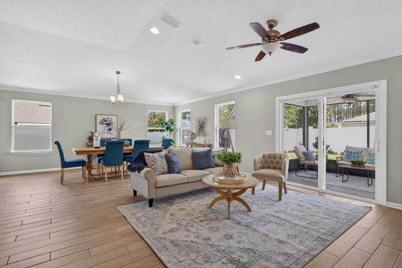 Open living and dining area with tile flooring at 10066 Andean Fox Dr, Jacksonville, FL 32222