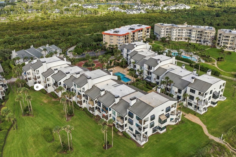 Aerial view of the condo building and grounds in Ponte Vedra Beach, FL