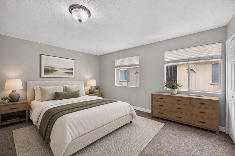 Virtually staged bedroom with bed and dresser at 1800 Park Ave apt 358, Orange Park, FL