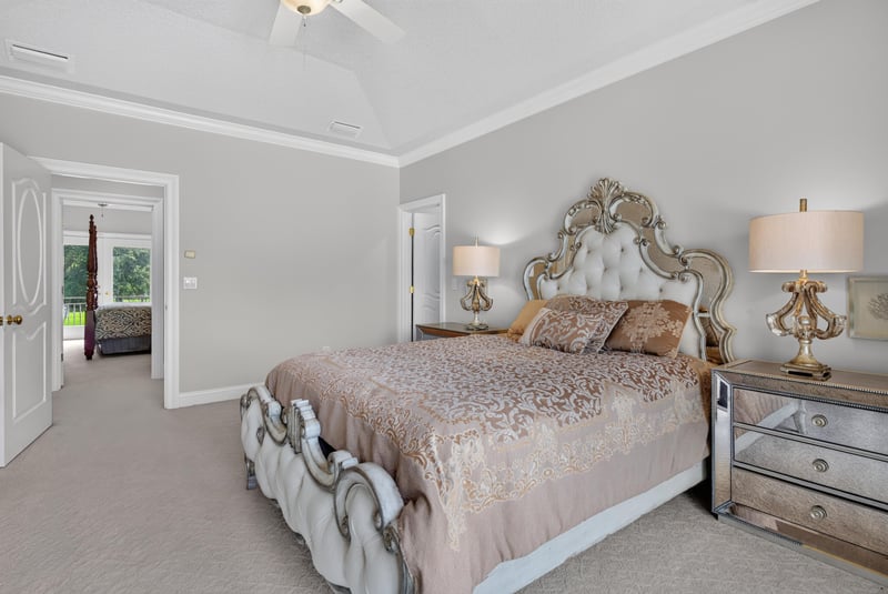 Bedroom with vanity and mirrored dresser at 344 Broward Rd, Jacksonville, FL