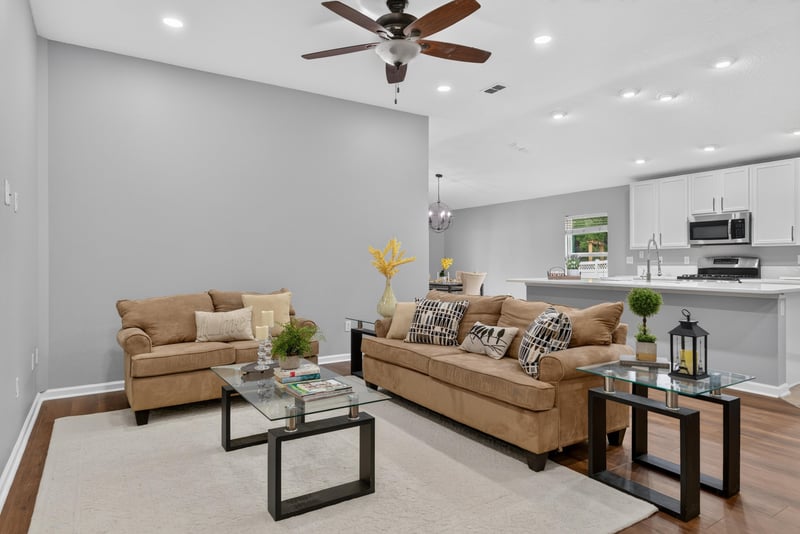 Living room with sofa and ceiling fan at 706 Grampian Highlands Dr, St. Johns, FL 32259