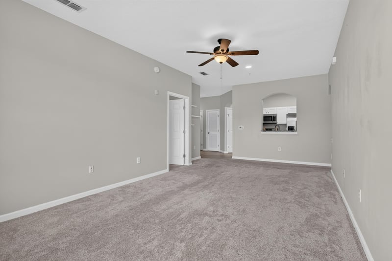 Living area opening to kitchen at 7990 Baymeadows Rd E #404, Jacksonville, FL 32256
