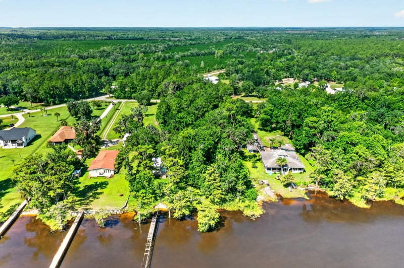 Aerial view of the river and neighboring docks at 110 River Shores Rd, Palatka, FL 32043