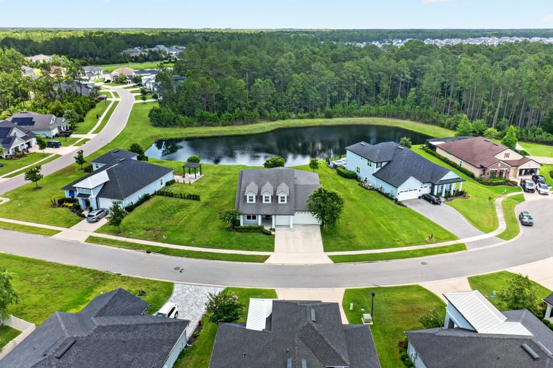 Aerial view of pond, cul-de-sac and surrounding homes in St. Augustine, FL