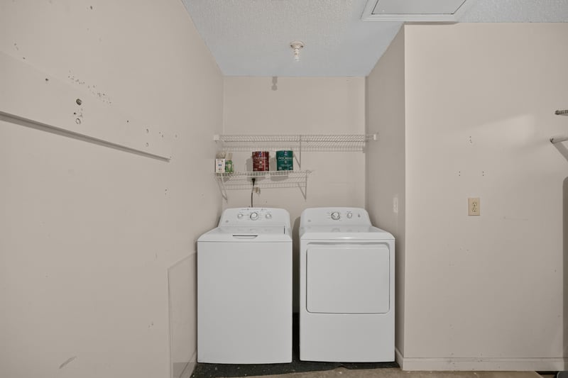 Laundry area with washer and dryer at 605 N Covered Bridge Rd, Jacksonville, FL