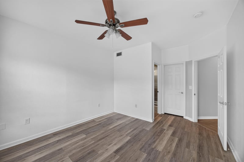 Empty room with ceiling fan and neutral walls at 10075 Gate Pkwy unit 1905, Jacksonville, FL 32246