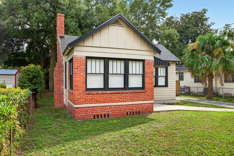 Front corner view showing chimney and brick facade at 316 W 41st St, Jacksonville, FL 32206