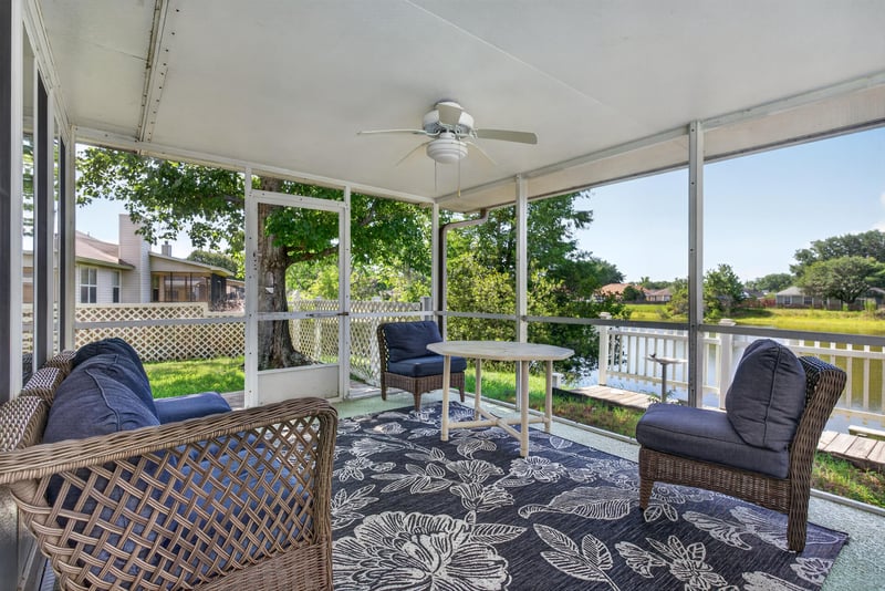 Sunroom with pool view at 8680 Bandera Cir S, Jacksonville, FL 32244