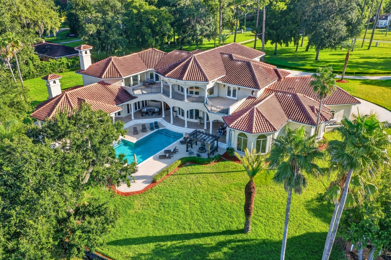 Aerial view of the pool and rear exterior at 344 Broward Rd, Jacksonville, FL