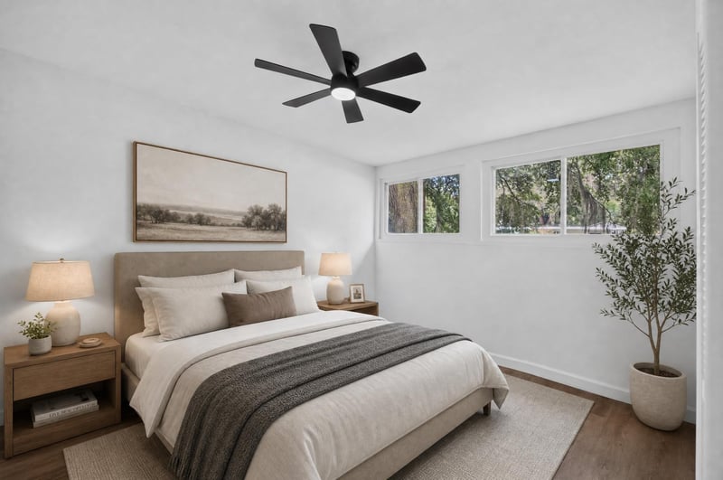 Staged bedroom with bed and nightstands at 3113 Kline Rd, Jacksonville, FL 32246