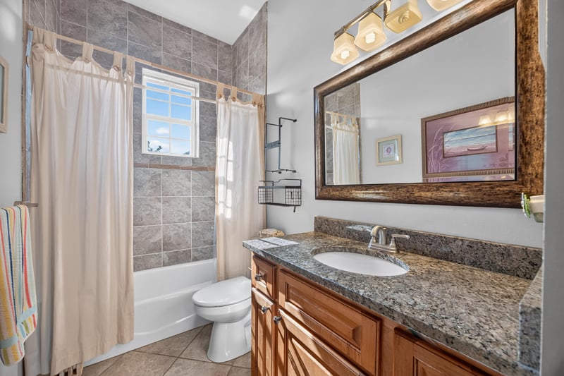 Bathroom with tub and shower combo at 1735 Hagans Ridge Ct