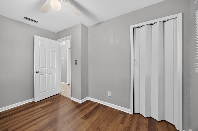 Empty room with closet doors at 4030 Leonard Cir W, Jacksonville, FL 32209