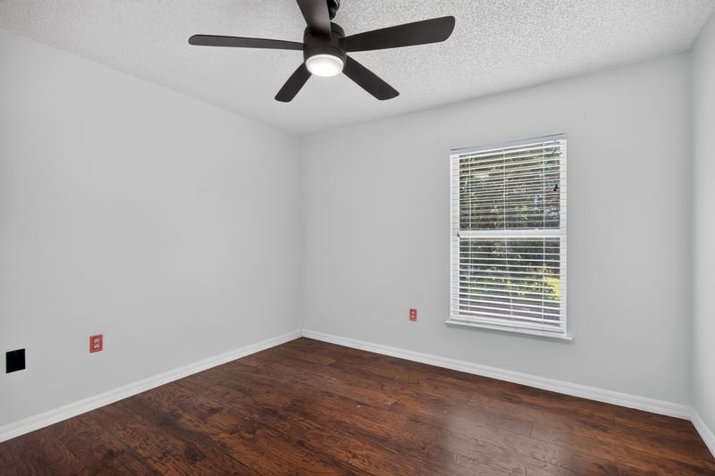 Bedroom with wood floor and ceiling fan at 3428 Glenn Hollow Ct, Jacksonville, FL 32226