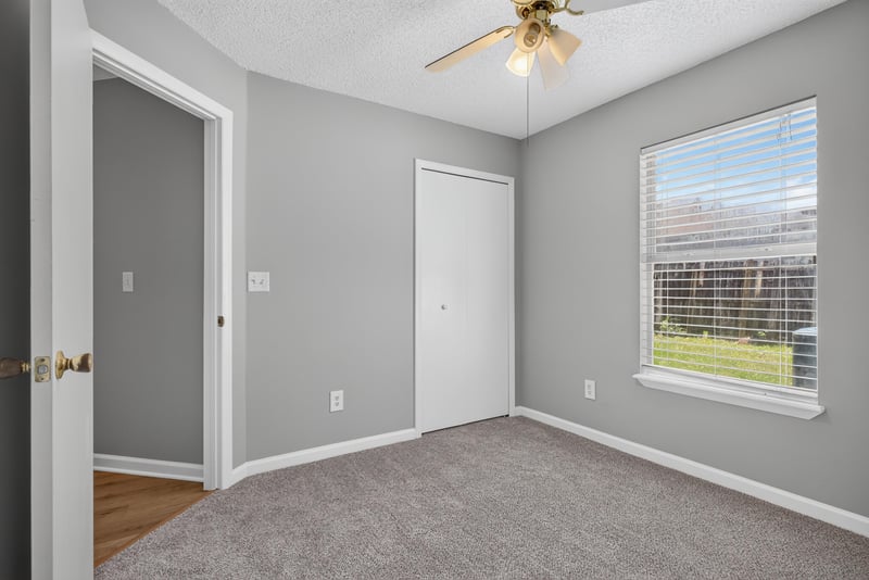Bedroom with carpet and window at 1108 Hidden Cove Cir S, Atlantic Beach, FL 32233
