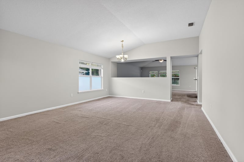 Living Room and Dining at 75277 Ravenwood Dr, Yulee, FL 32097