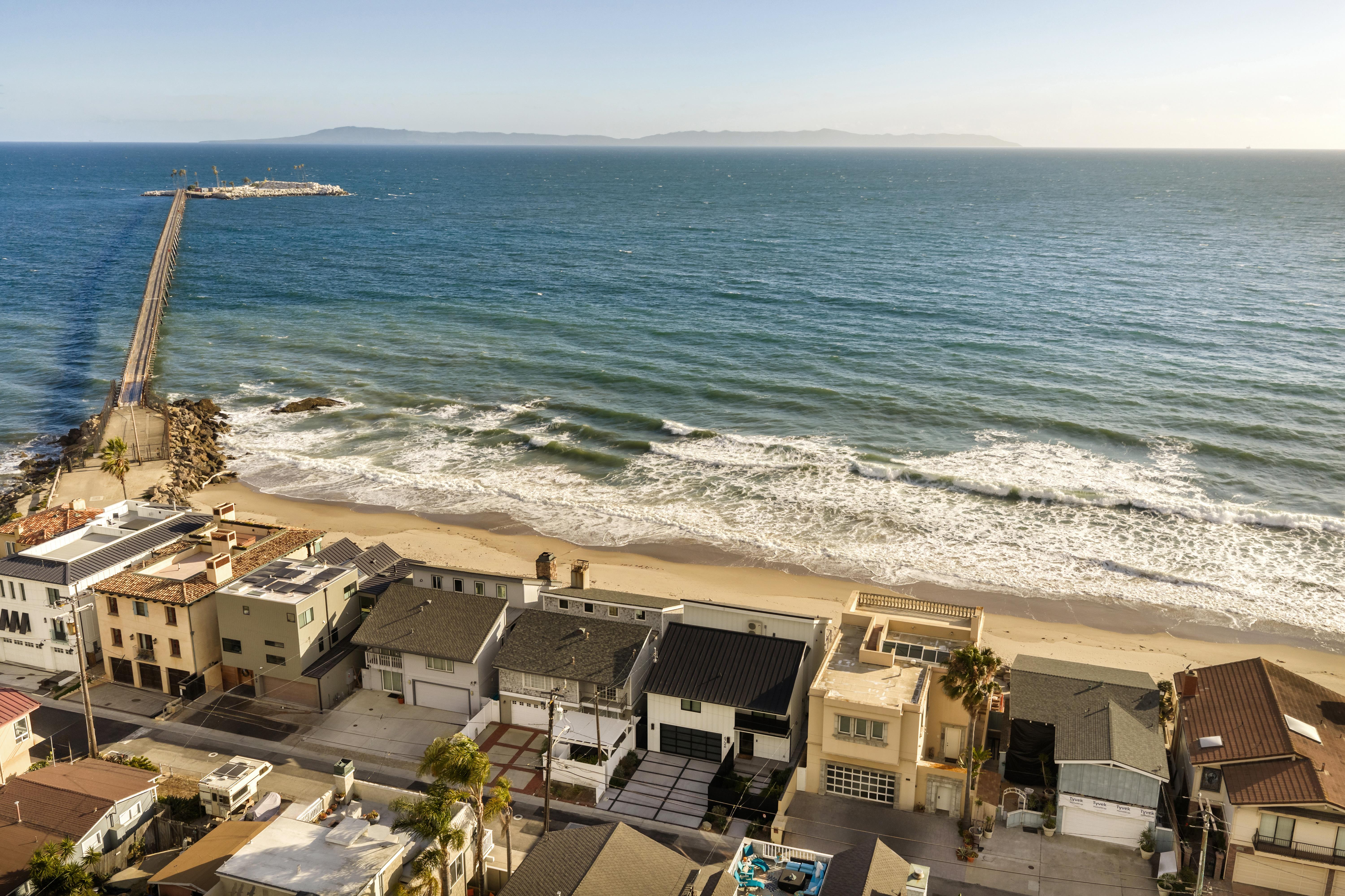 Real estate photography virtual tour of luxury coastal home at 6726 Breakers Way, Ventura — interior and exterior editorial stills document the interplay of natural light and ocean atmosphere throughout the residence. Our team captured still photography, aerial drone photography with Inspire 3 Cinema Drone, FPV clips, a cinematic property video with agent narration, a Matterport virtual tour, a Zillow Showcase, a true vertical social media reel, and floor plan scan throughout the early morning.
