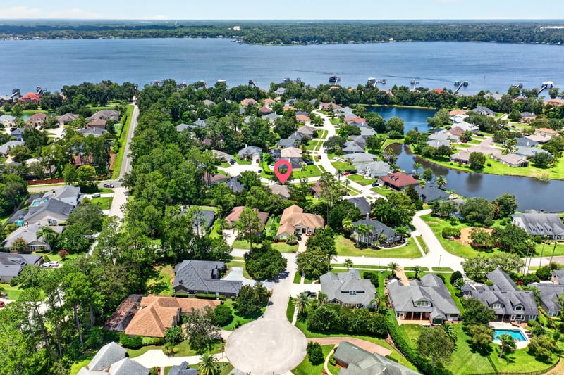 Aerial view of neighborhood and lake in Fleming Island, FL