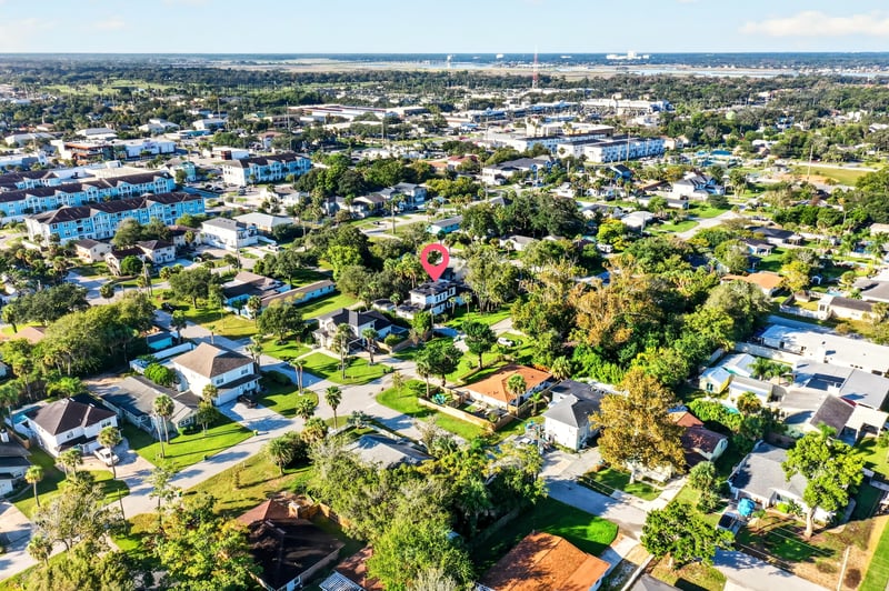 Aerial panoramic view of the neighborhood with the home marked in Jacksonville Beach, FL